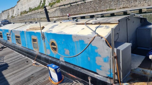Marina boat restoration side in progress