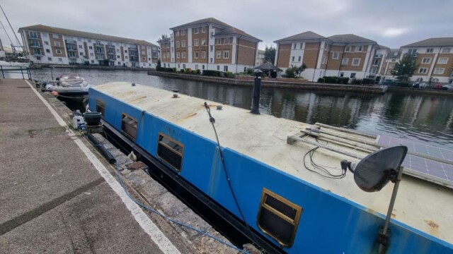worn brighton marina boat