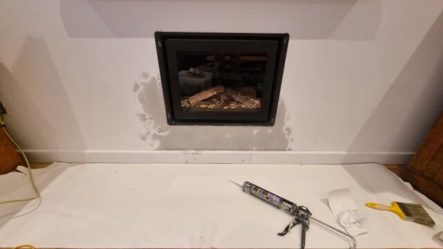 under fire place wall painting lewes