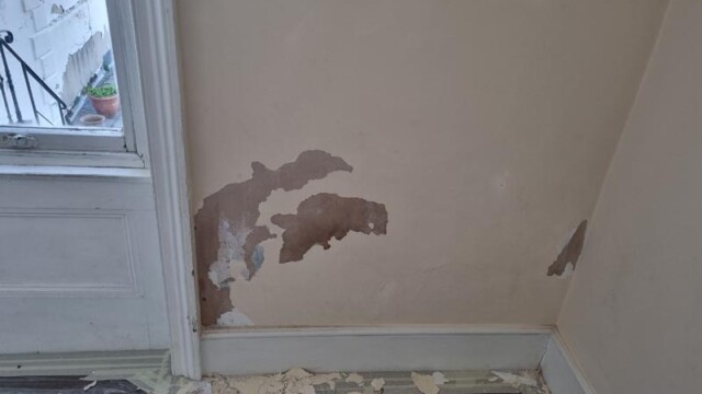 damaged wall before repair brighton